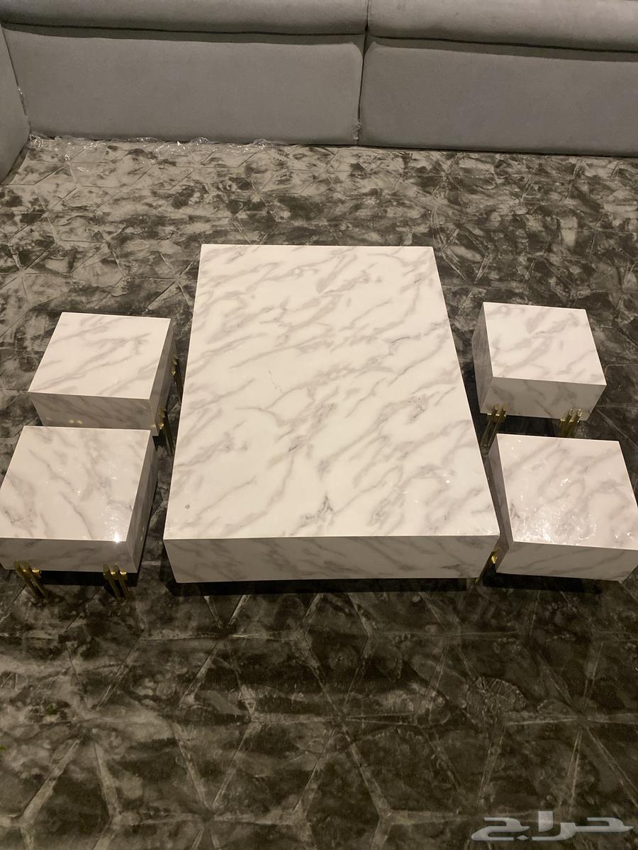 A large table with four small ones64513921696642110