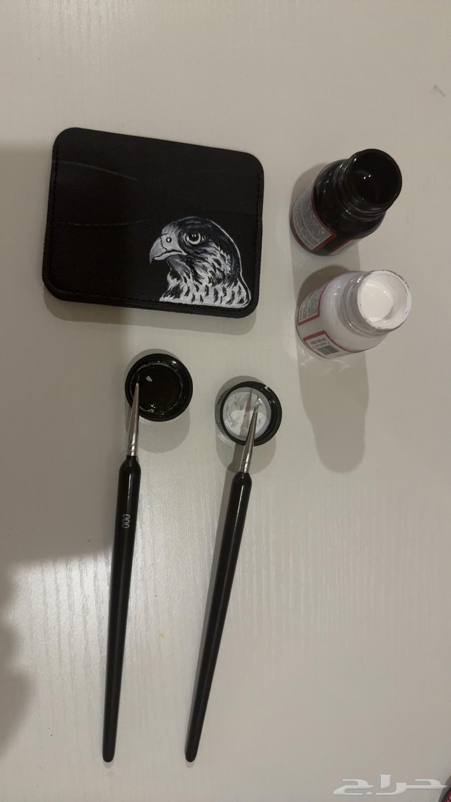 Drawing on wallet and medal64525774114563113