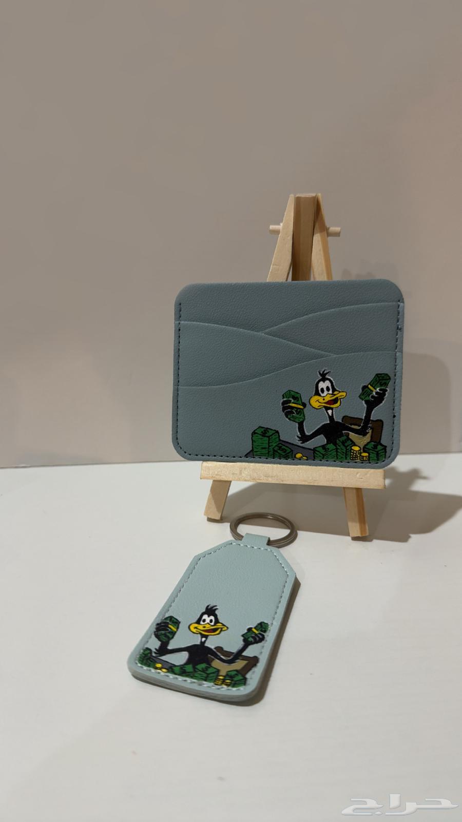 Drawing on wallet and medal64525774114563112