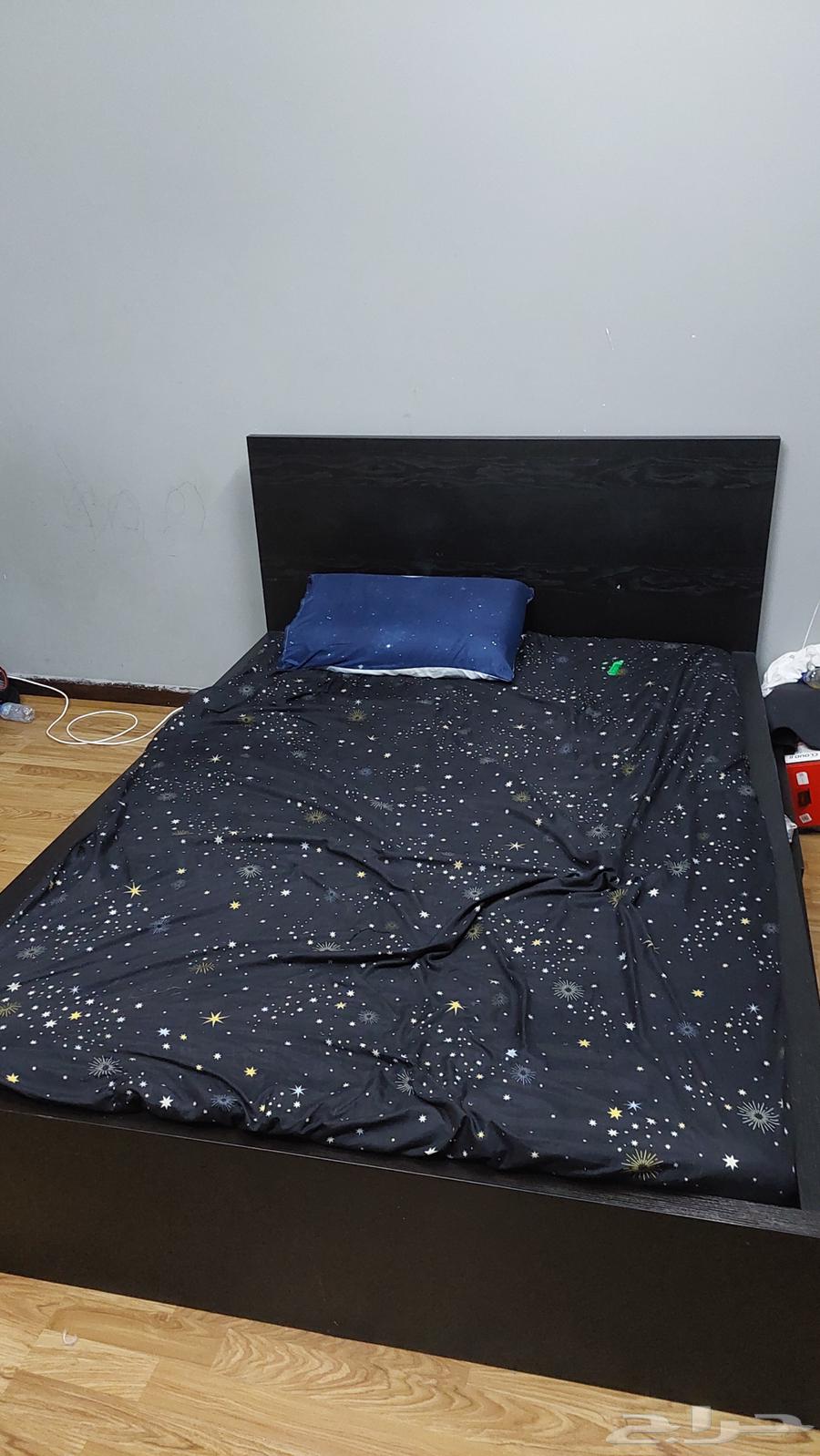 Two bed sets, sofa, and table under the screen64520247288450114