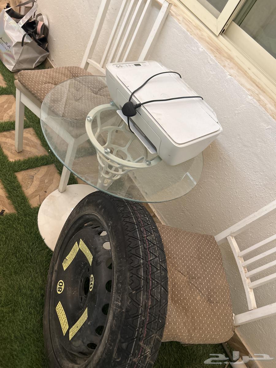 Various dining table and chairs, printer, and new spare tire64522047479169110