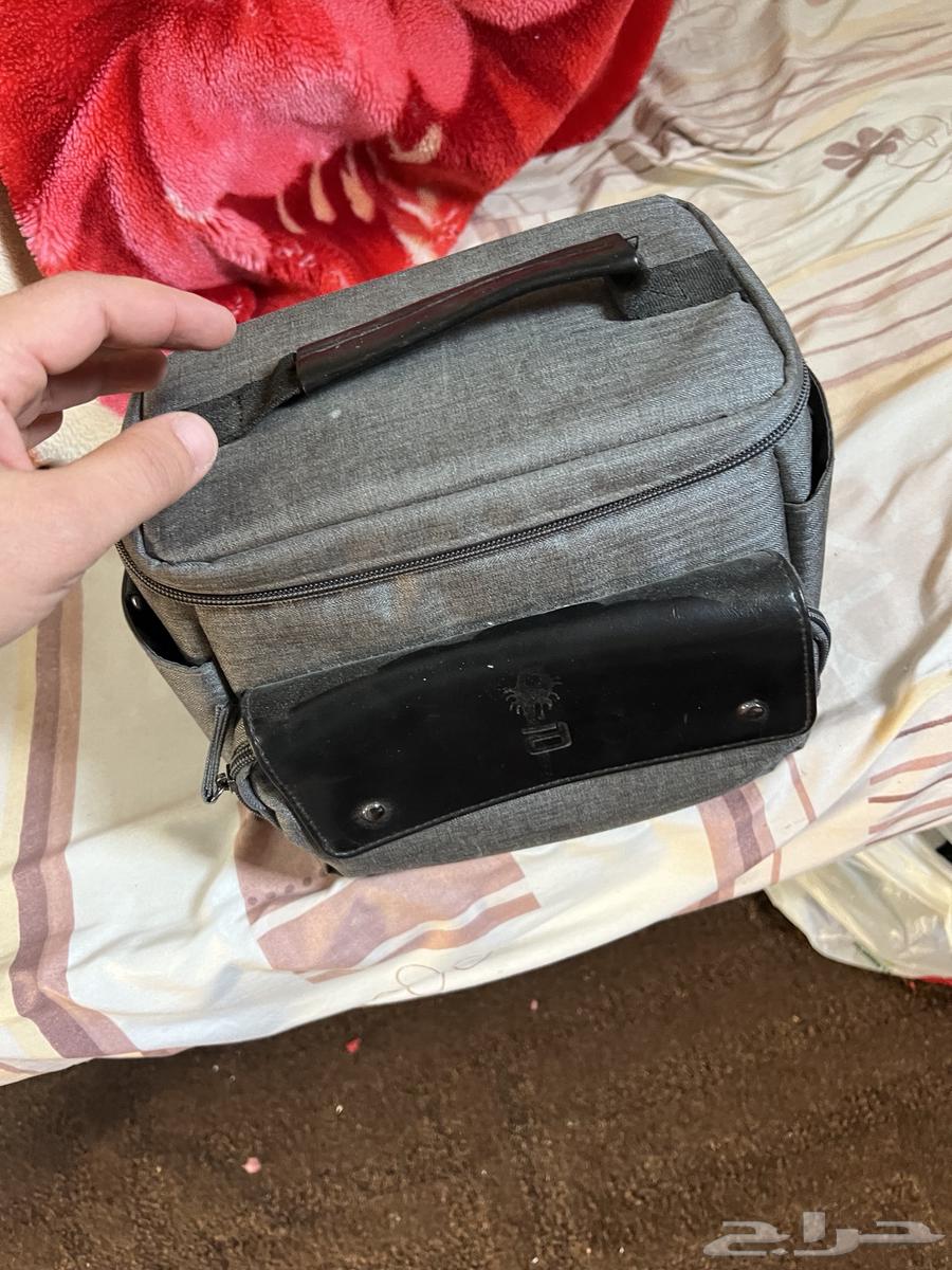 عدسة كاميرا كانون   شنطة كاميرا64525870267265111