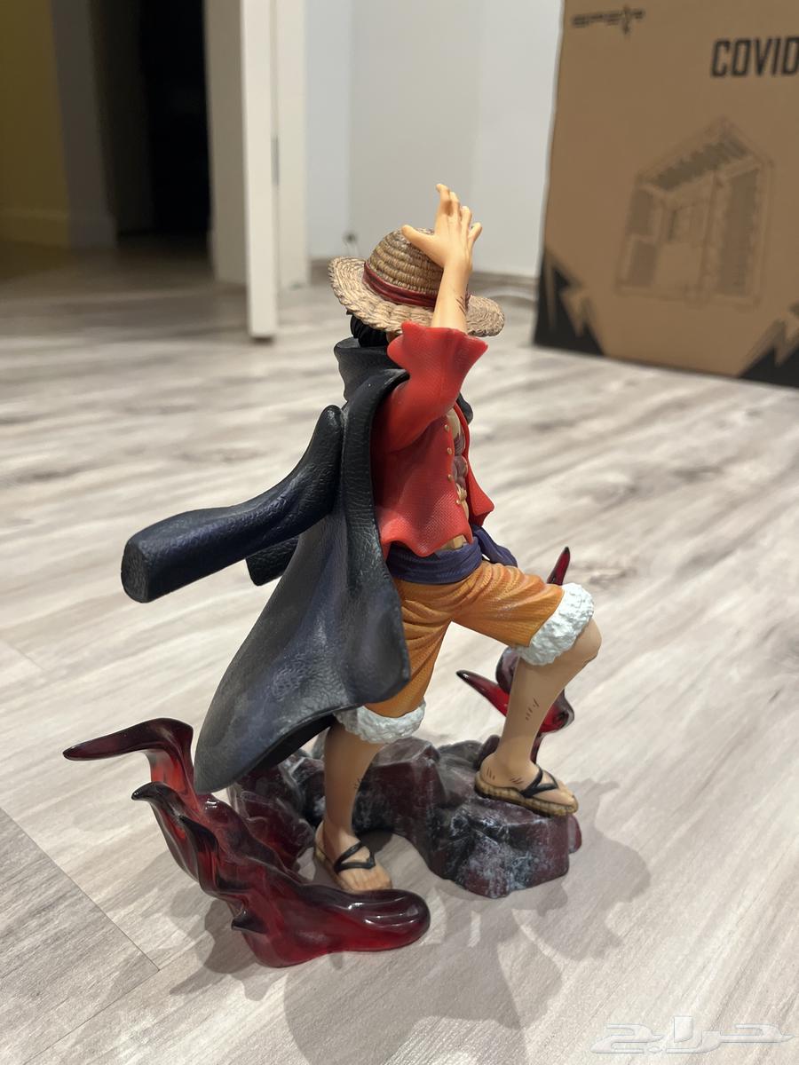 Figuers of Luffy with illuminated figure from Attack on Titan64525801420802112