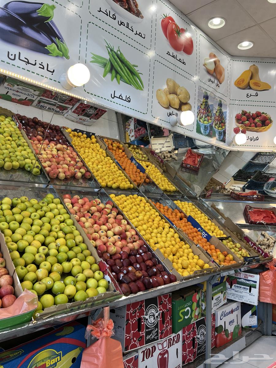 Vegetable, fruit, and date shop ready on a main street64144259059331112