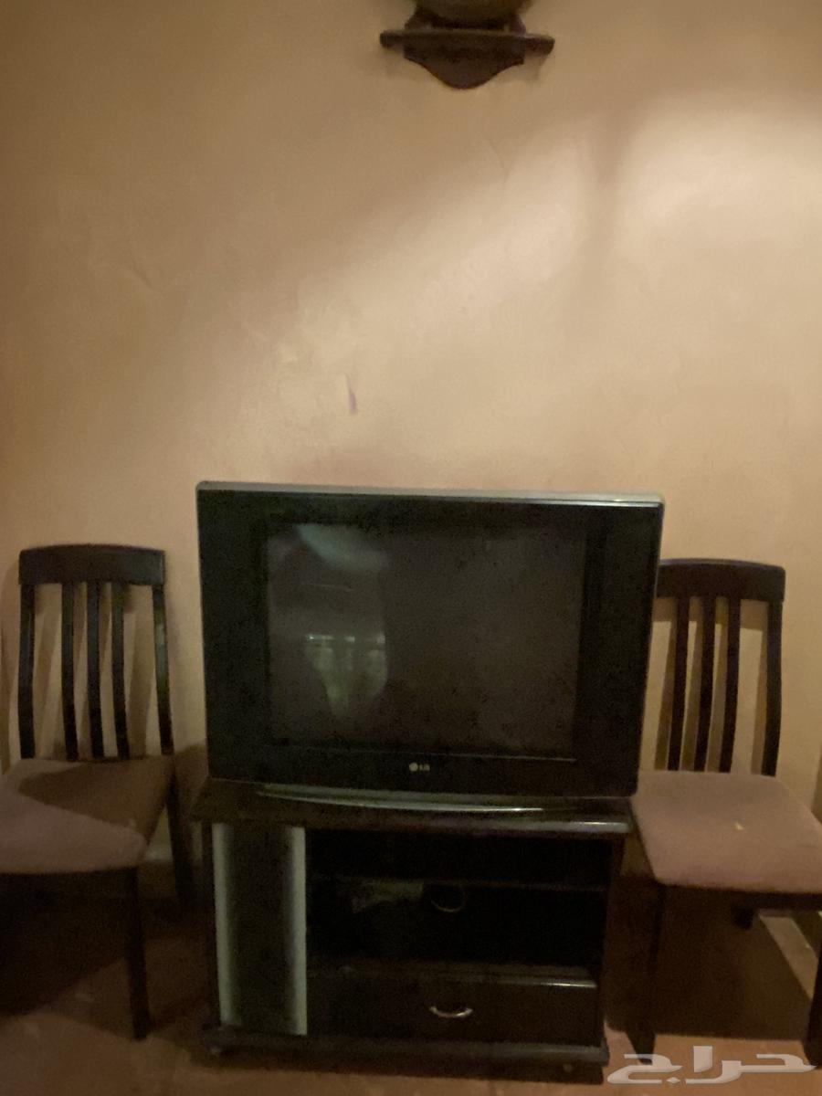 Sofa for sale with TV, table and entrance64522317082369111