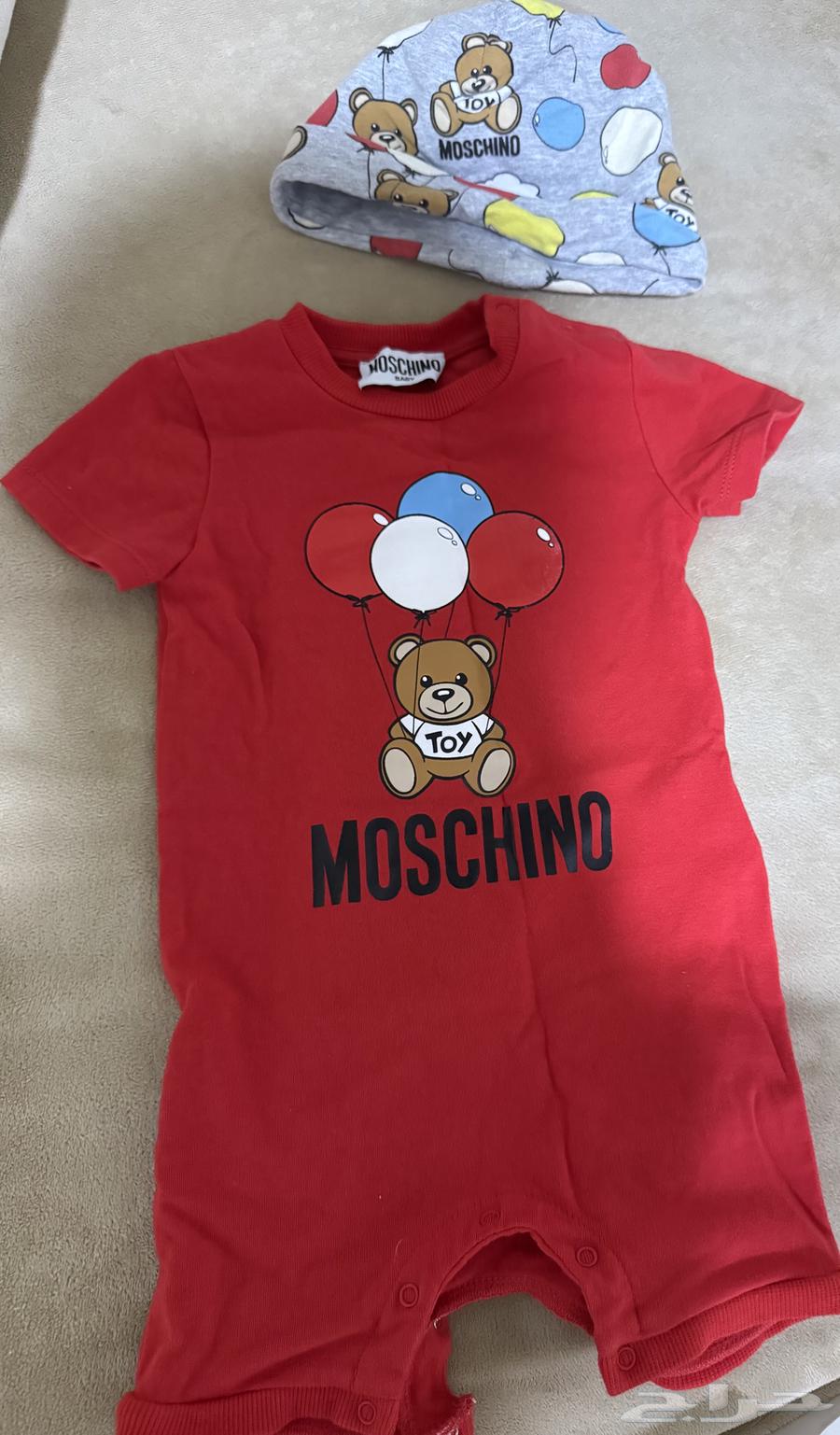 لبس اطفال مواليد ماركة موسكينو احمر64528450356865110