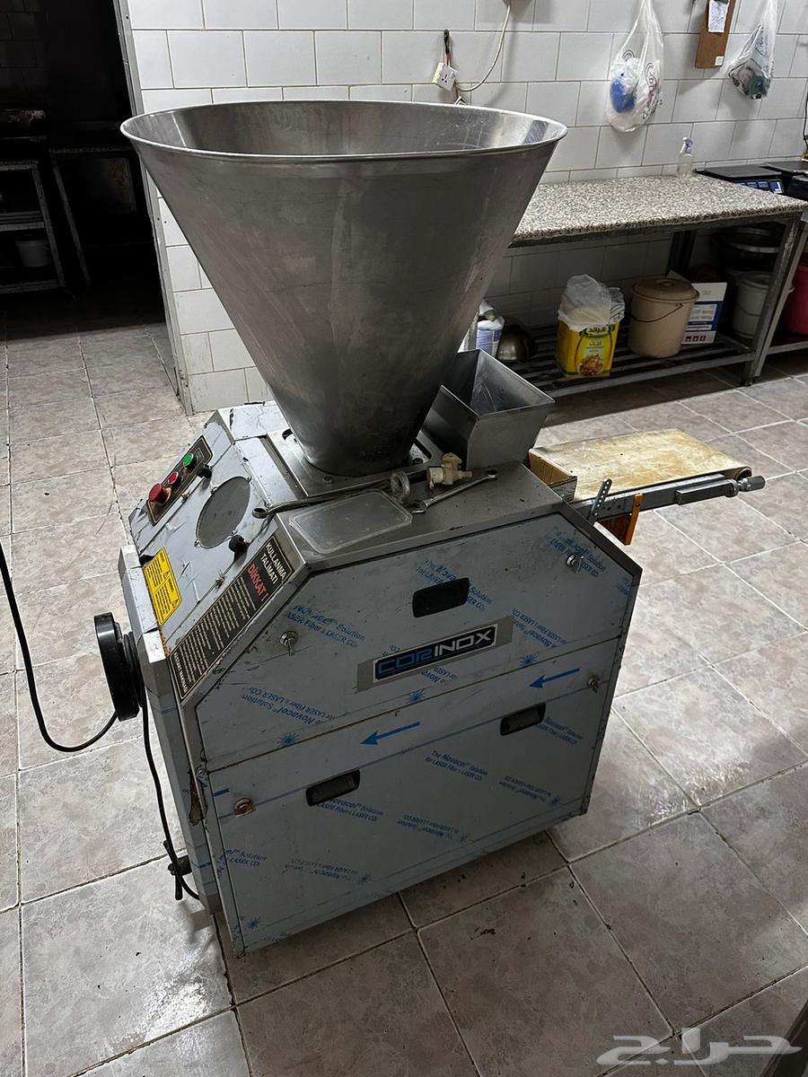 Rotating oven, slicer and grinder64531096401154112