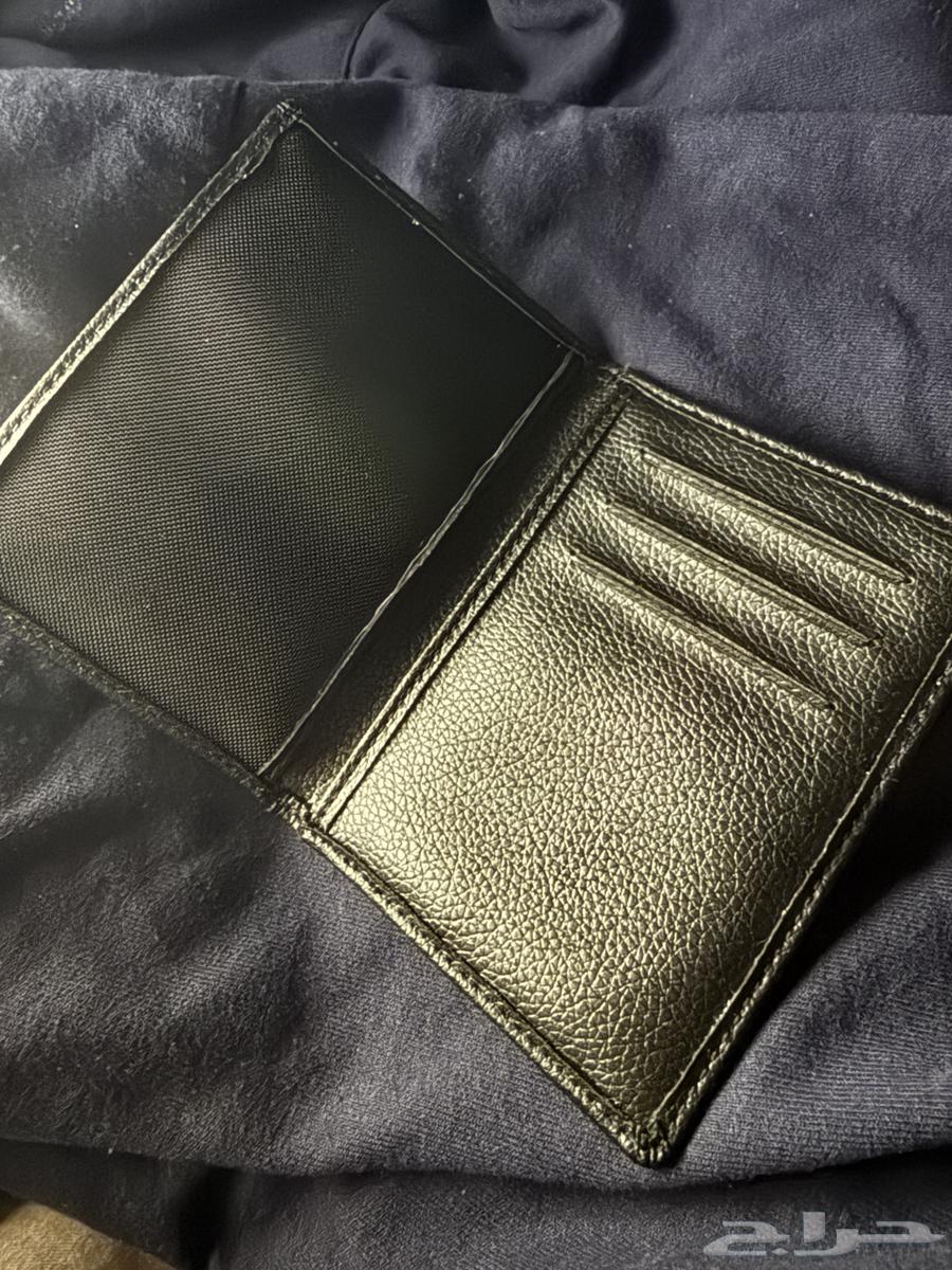 محفظة BMW اللي تجي هديه مع السيارة. للسوم64534521511809112