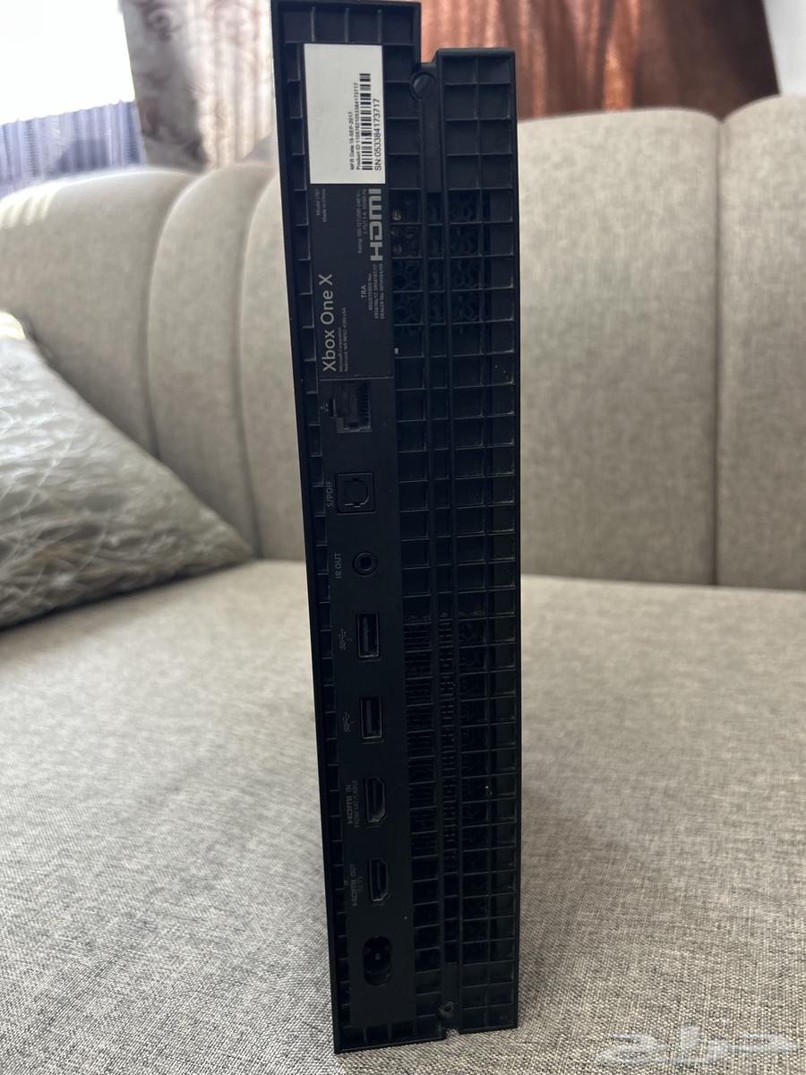 Xbox One X with Controller and Games64530712638338114