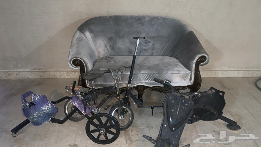 The sofa has nothing in it and the scooters need tires badly64529769858305110