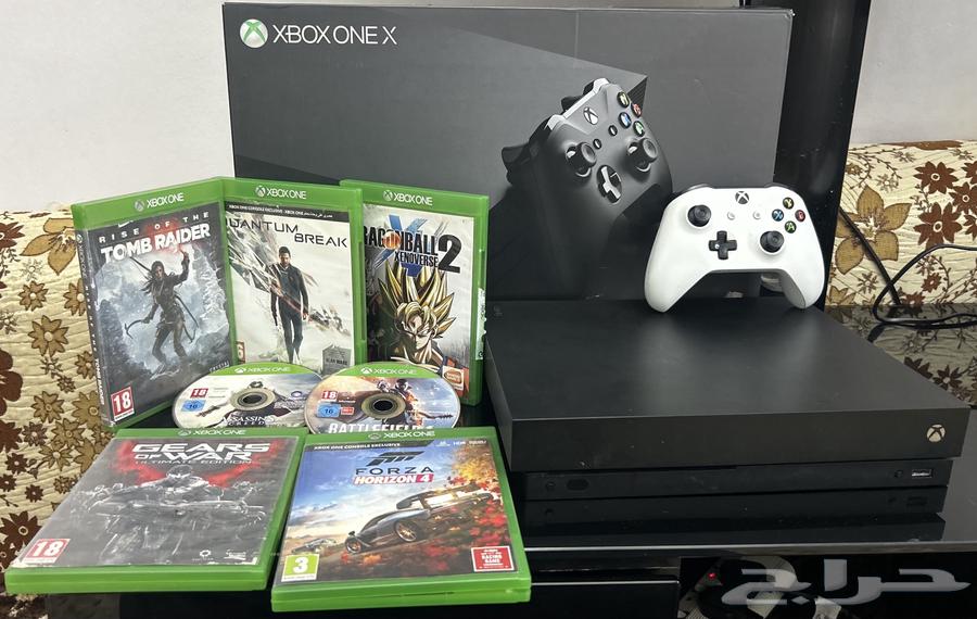 Xbox One X with Controller and Games64530712638338110