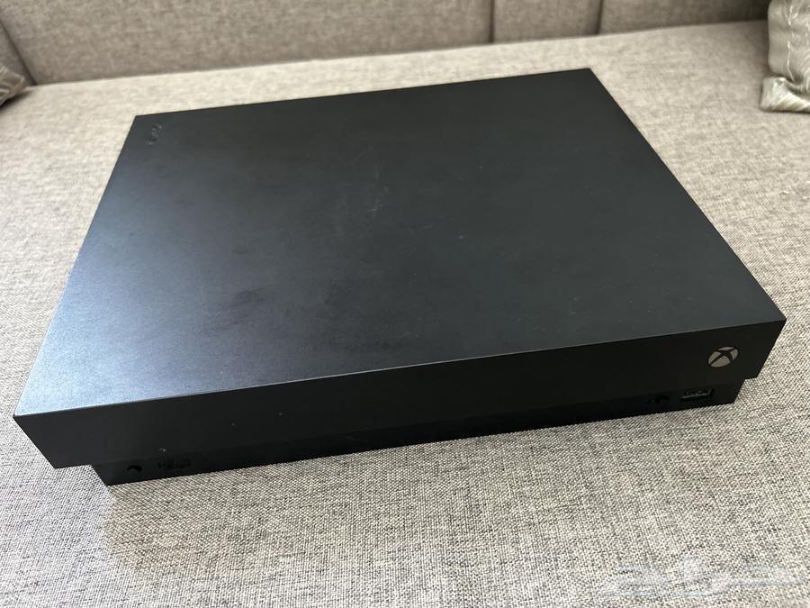 Xbox One X with Controller and Games64530712638338113