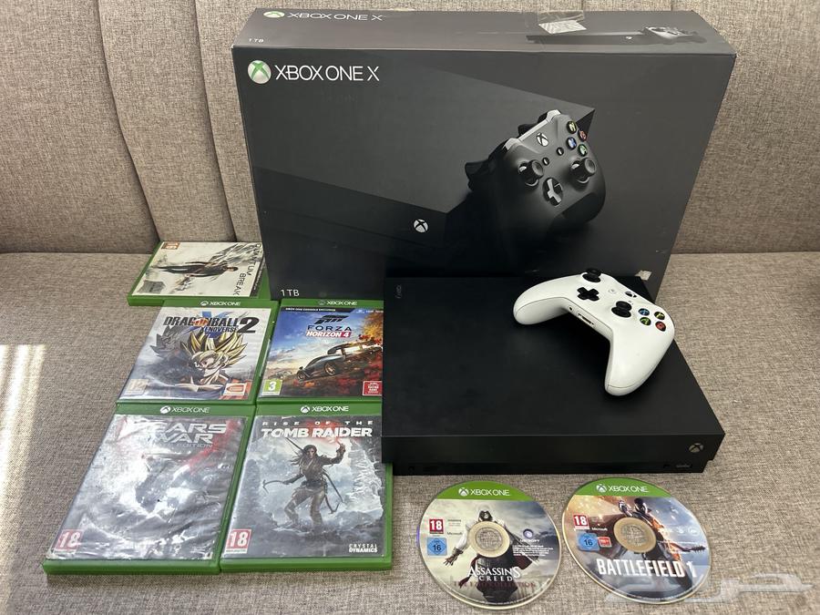Xbox One X with Controller and Games64530712638338111