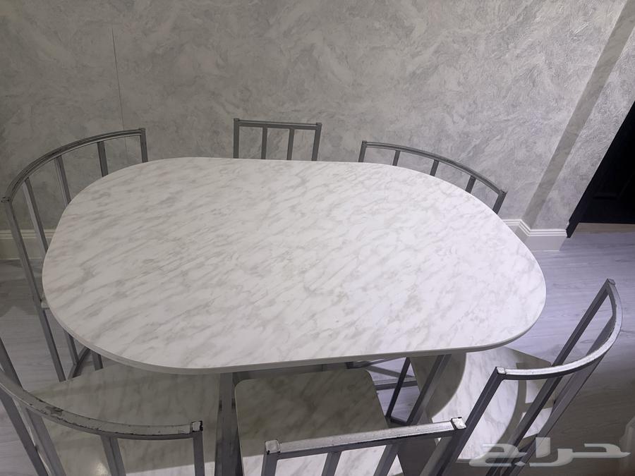 Table with six chairs64530458882433110