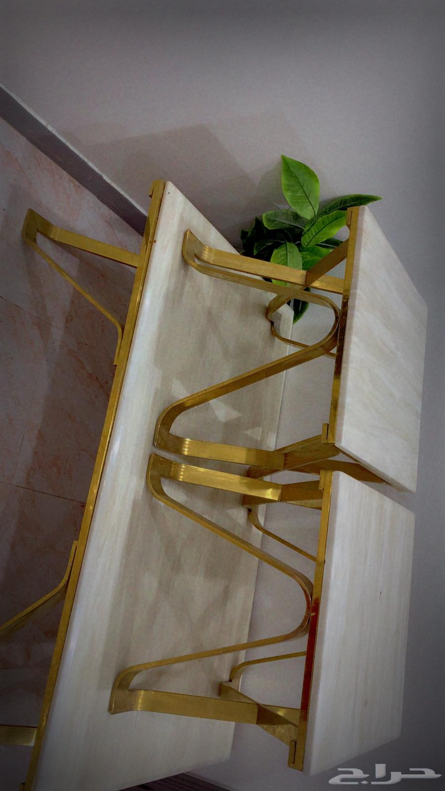 Three marble serving and hospitality tables plus a movable TV stand64535778789762111