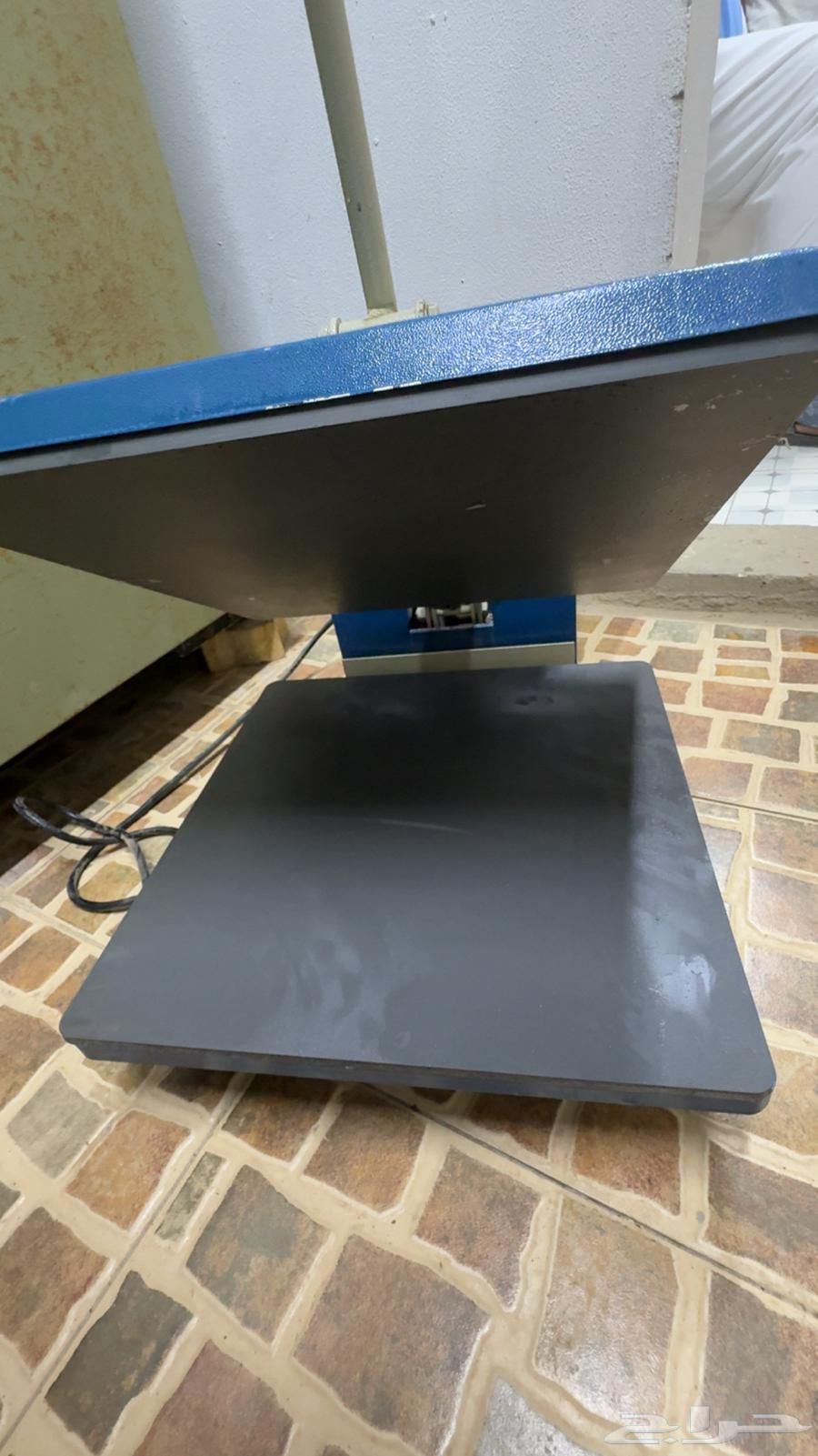 جهاز طباعة الملابس64542415808770114