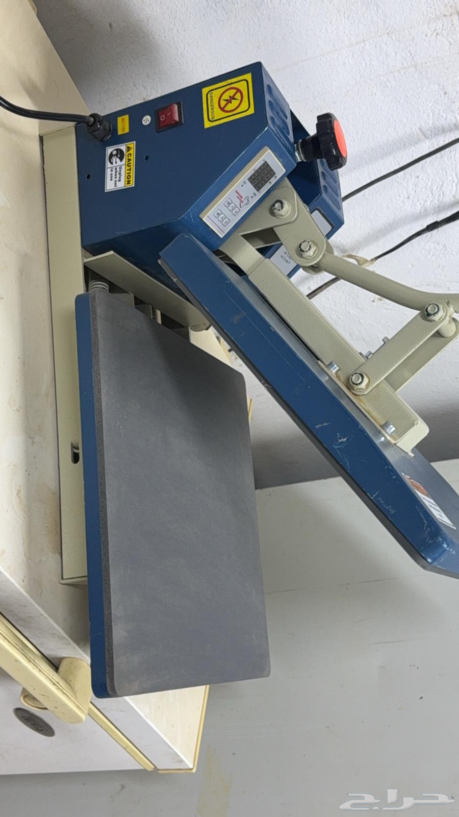 جهاز طباعة الملابس64542415808770110