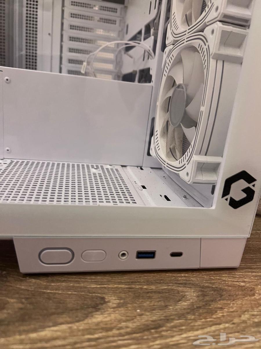 White PC case with motherboard, graphics card, processor, RAM64537338157442112