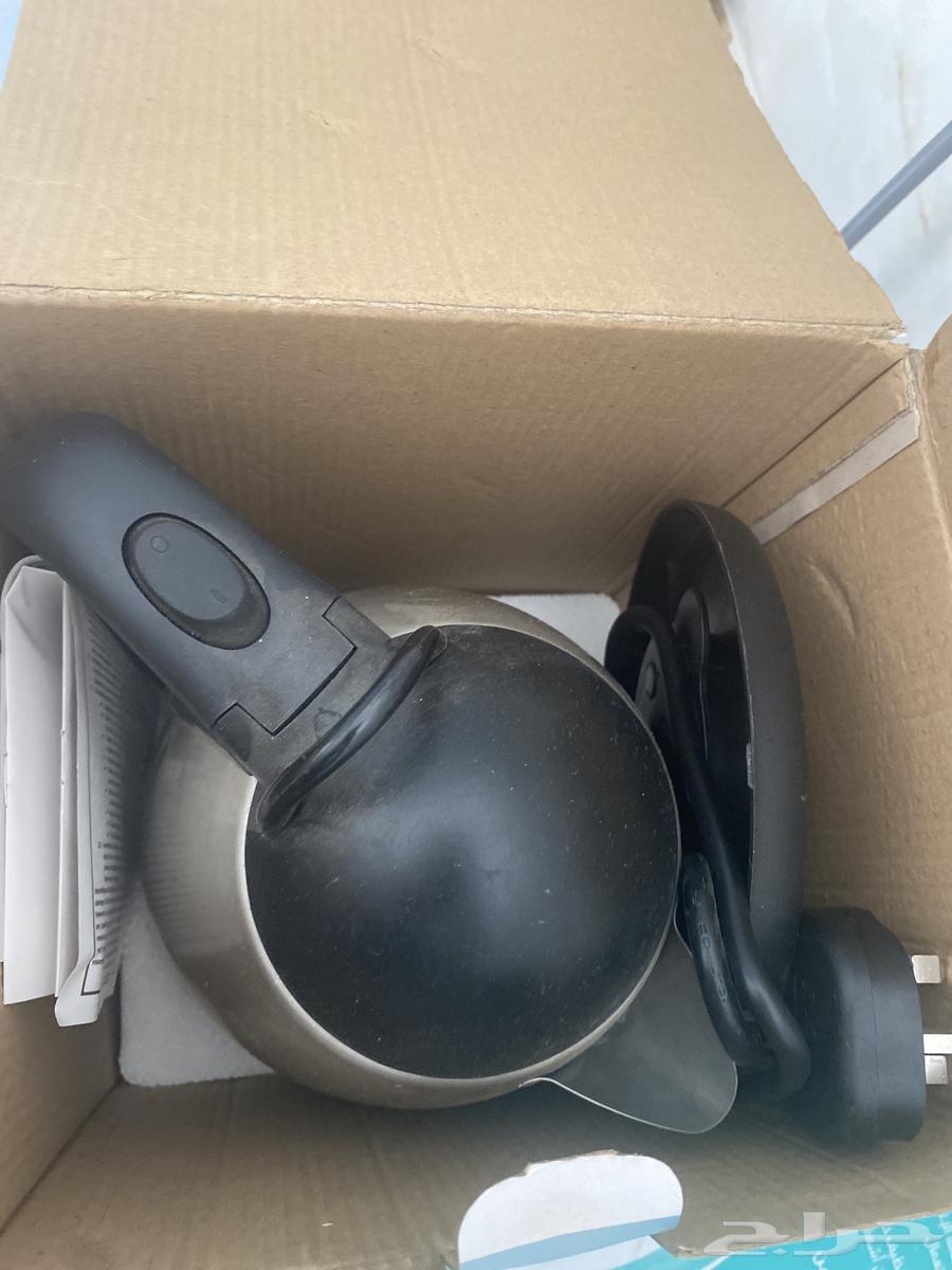 A new kettle with its accessories and original box, never used64538850452610111