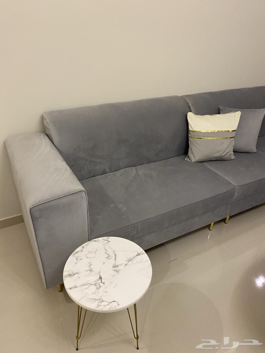 New gray sofa with cushions, tables, and curtain64543365828481110