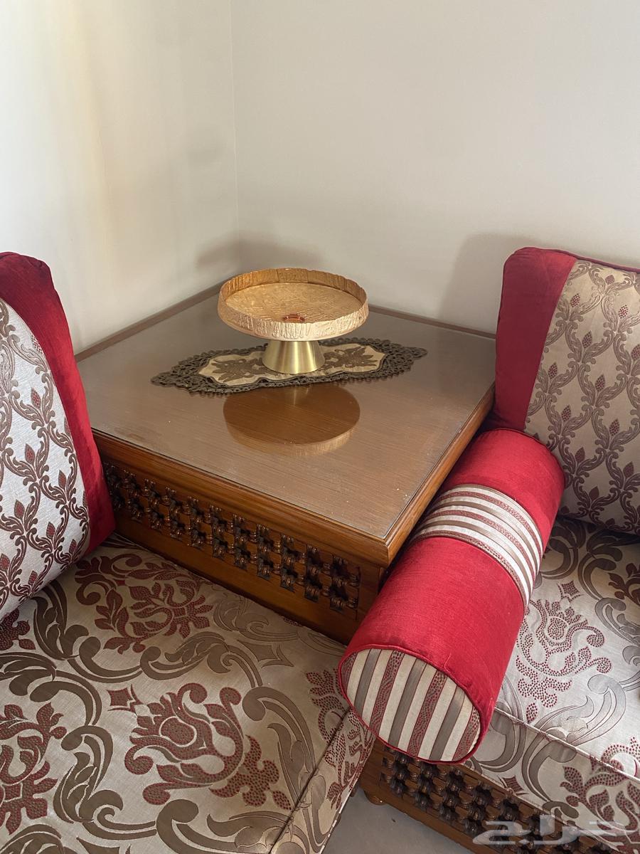 A complete Moroccan living room set with sofa, curtains, rug, and service tables64539158853377113
