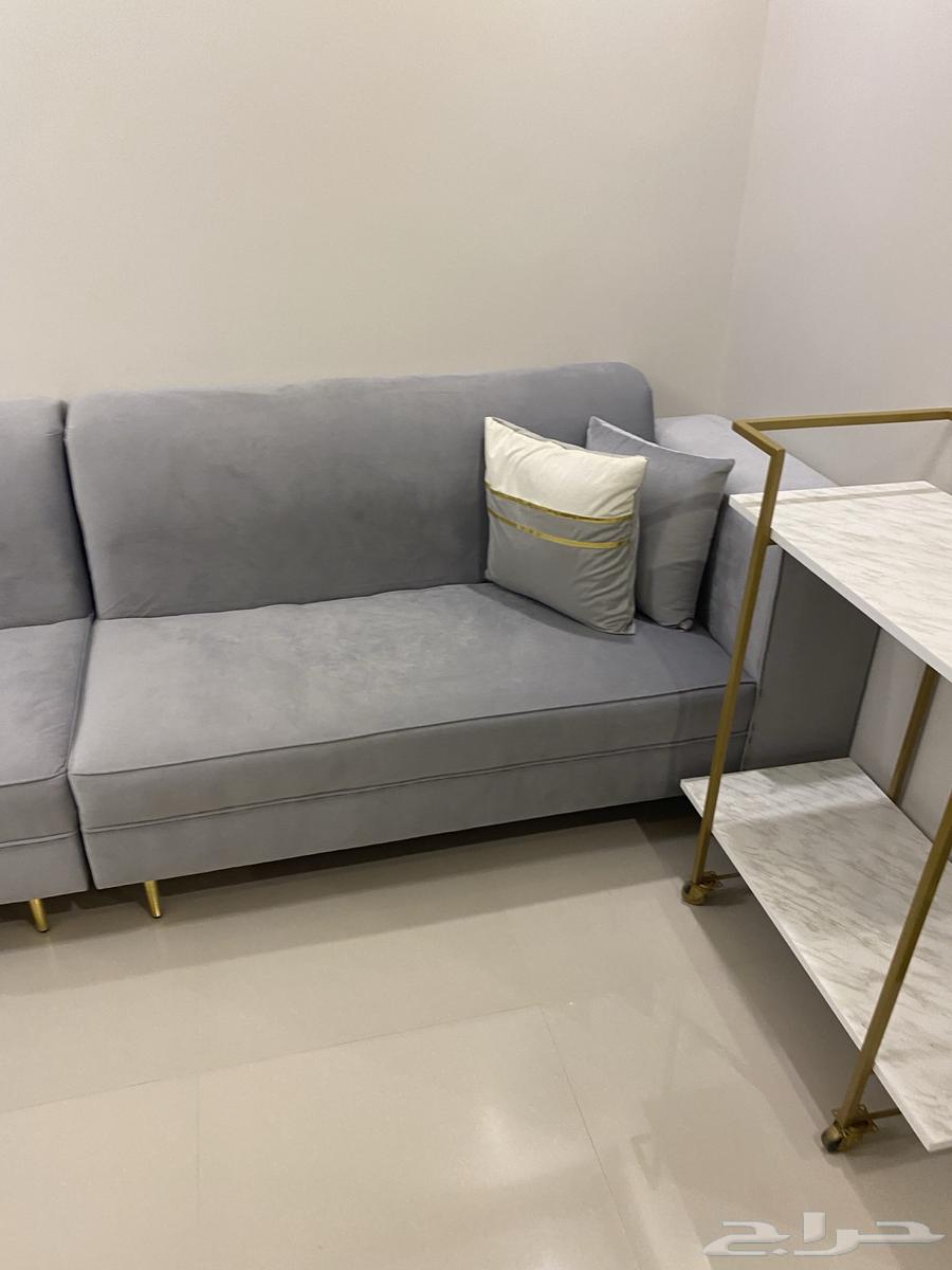 New gray sofa with cushions, tables, and curtain64543365828481114