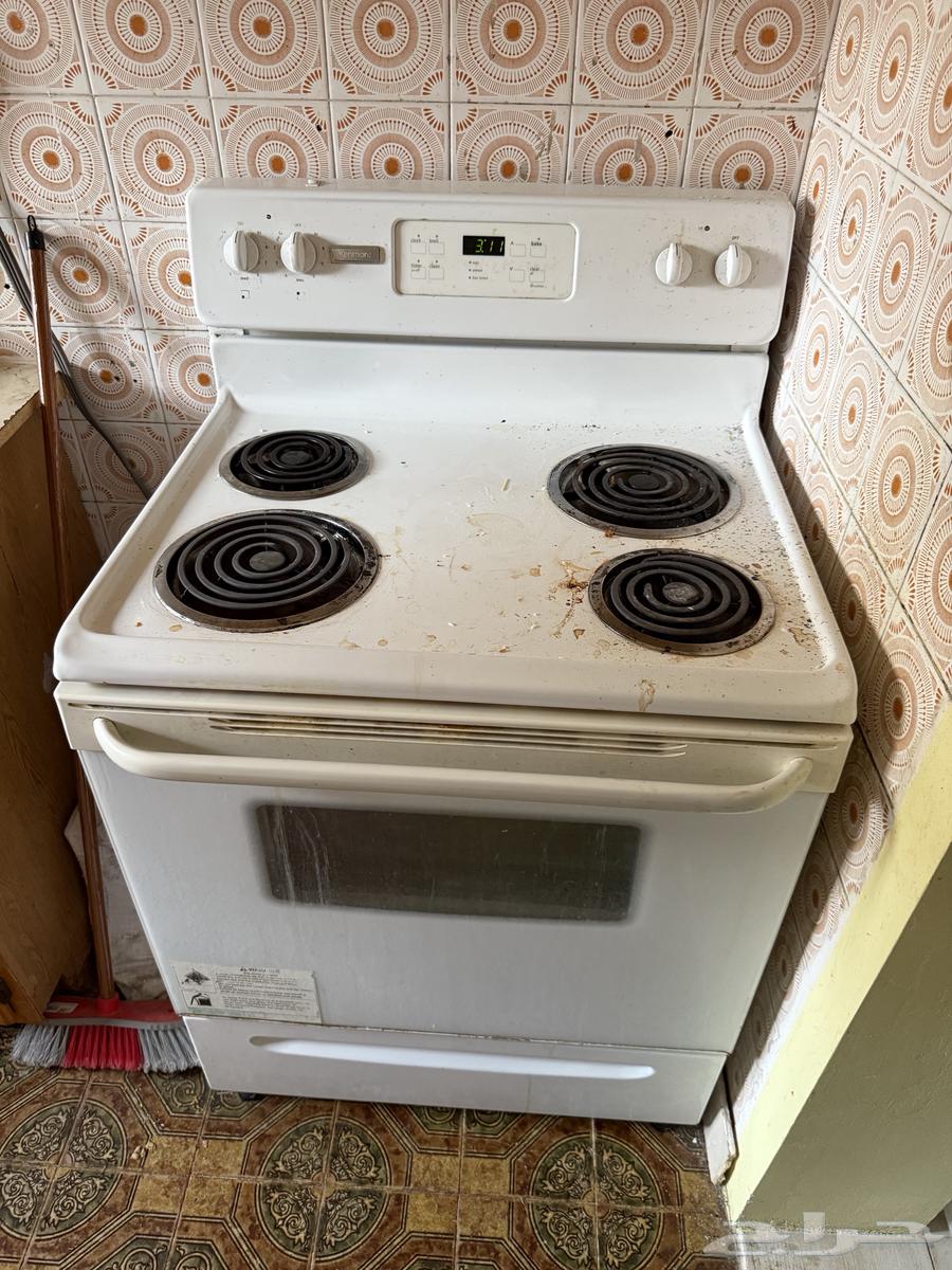 Gas stove and dining table with 6 chairs and a large mattress64543125326083114