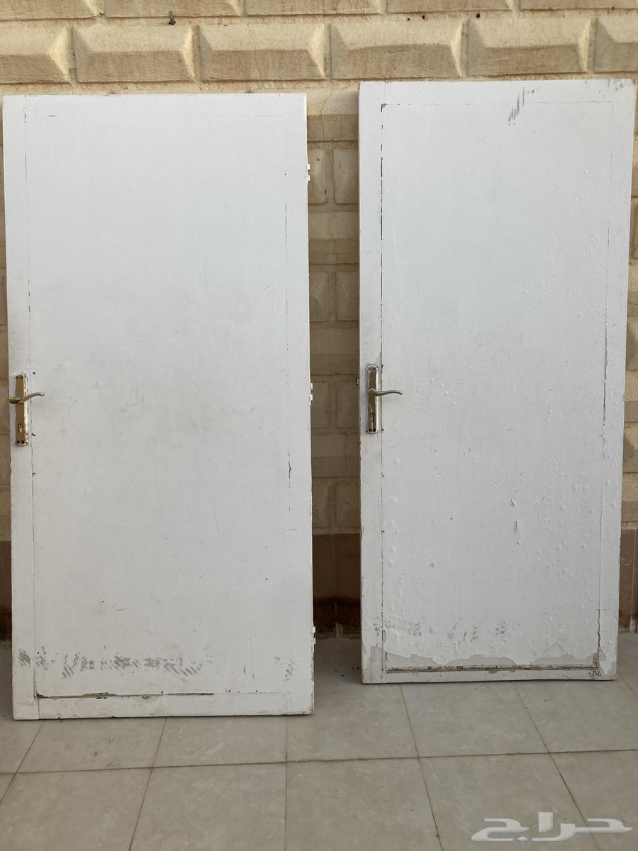 عندي بابين خشب عارضهم64540224369666110