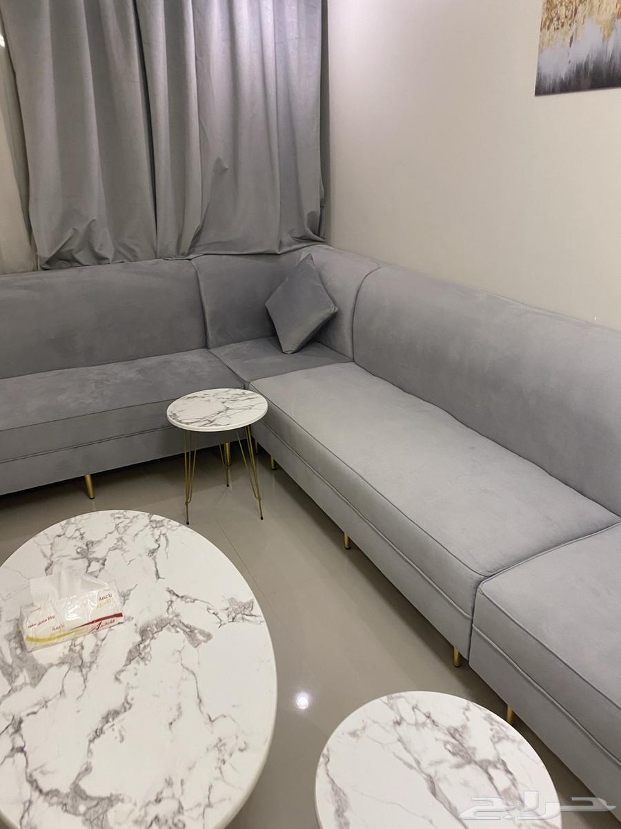 New gray sofa with cushions, tables, and curtain64543365828481112