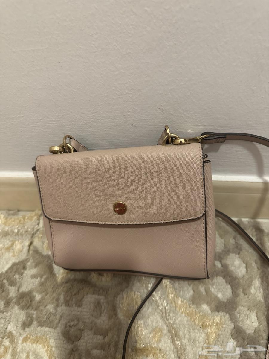 شنطتين وجزميتين استعمال قليل64535527375618112