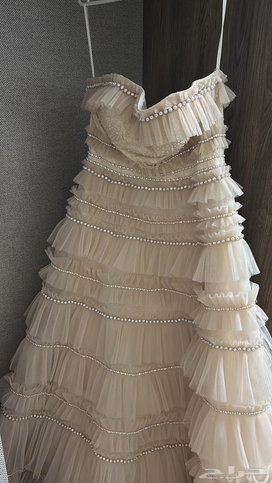 فستان جديد ماانلبس إلا مرا وحده64539556820611111