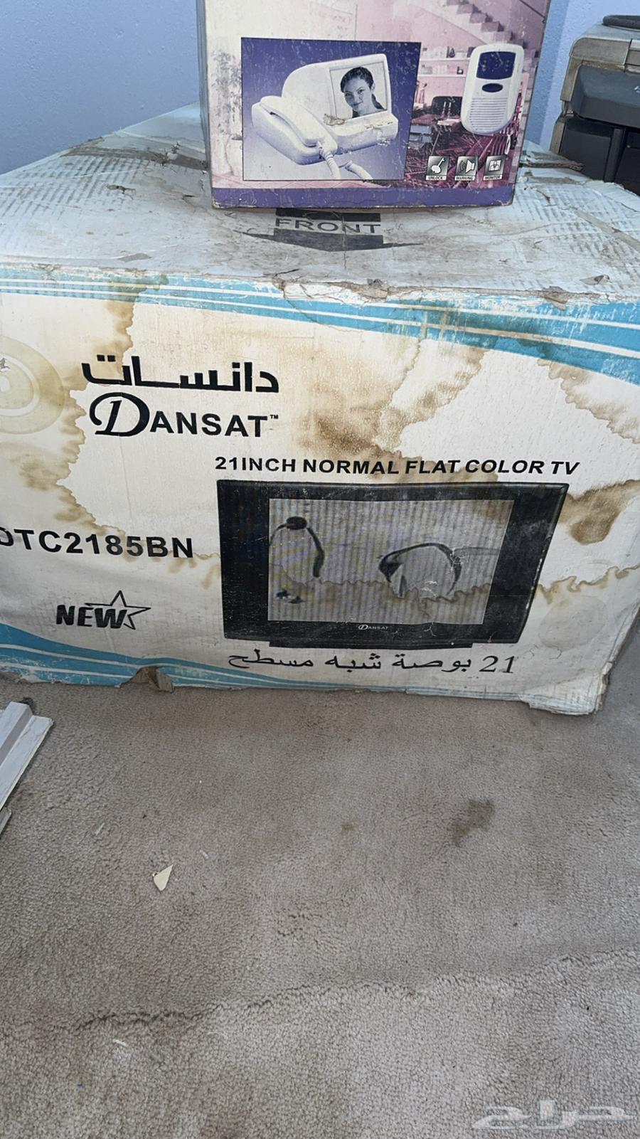 A new phone and an old and new TV in the box64545524748675111