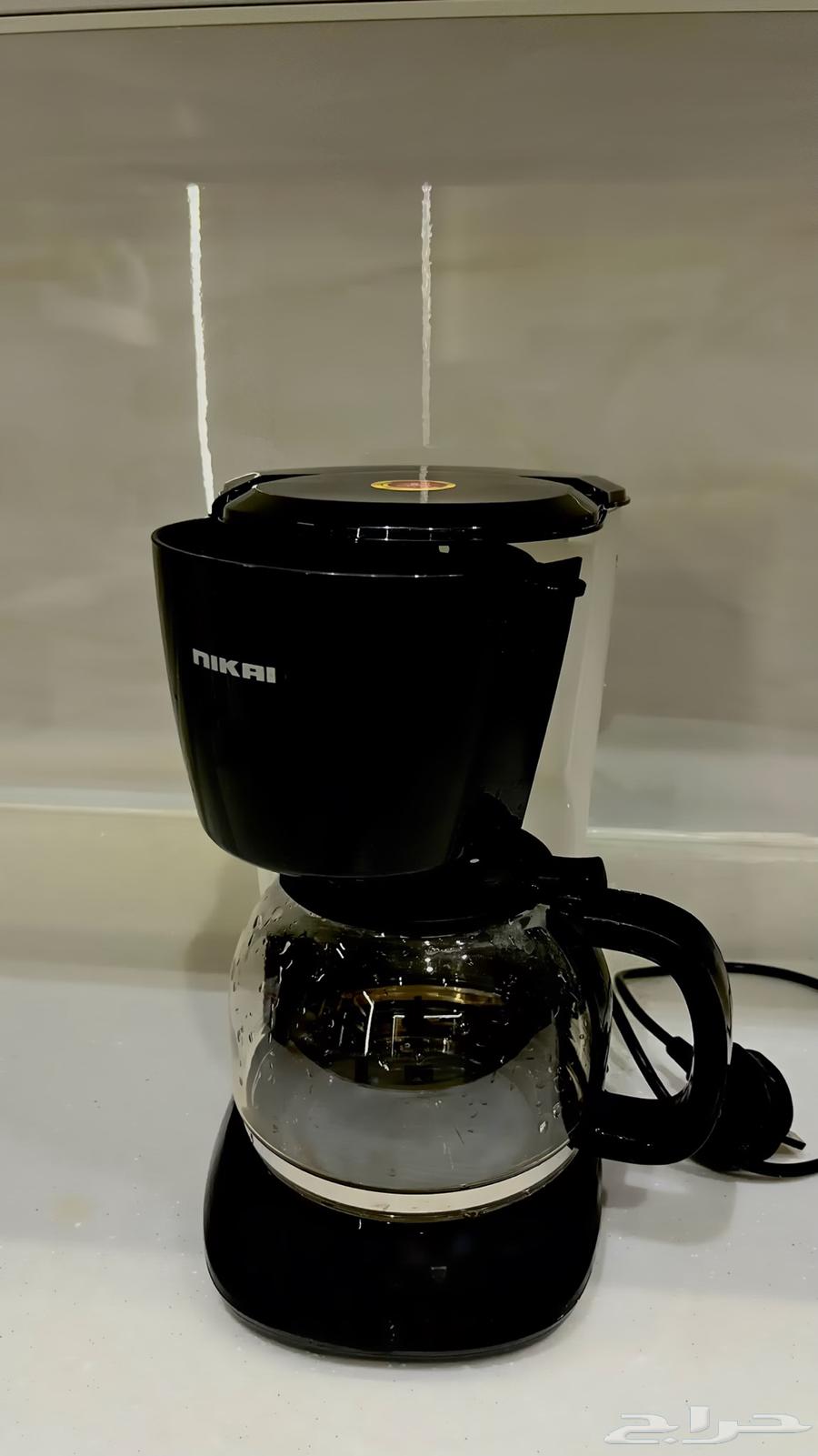 ماكينة قهوة سوداء مقطره64544368328450110