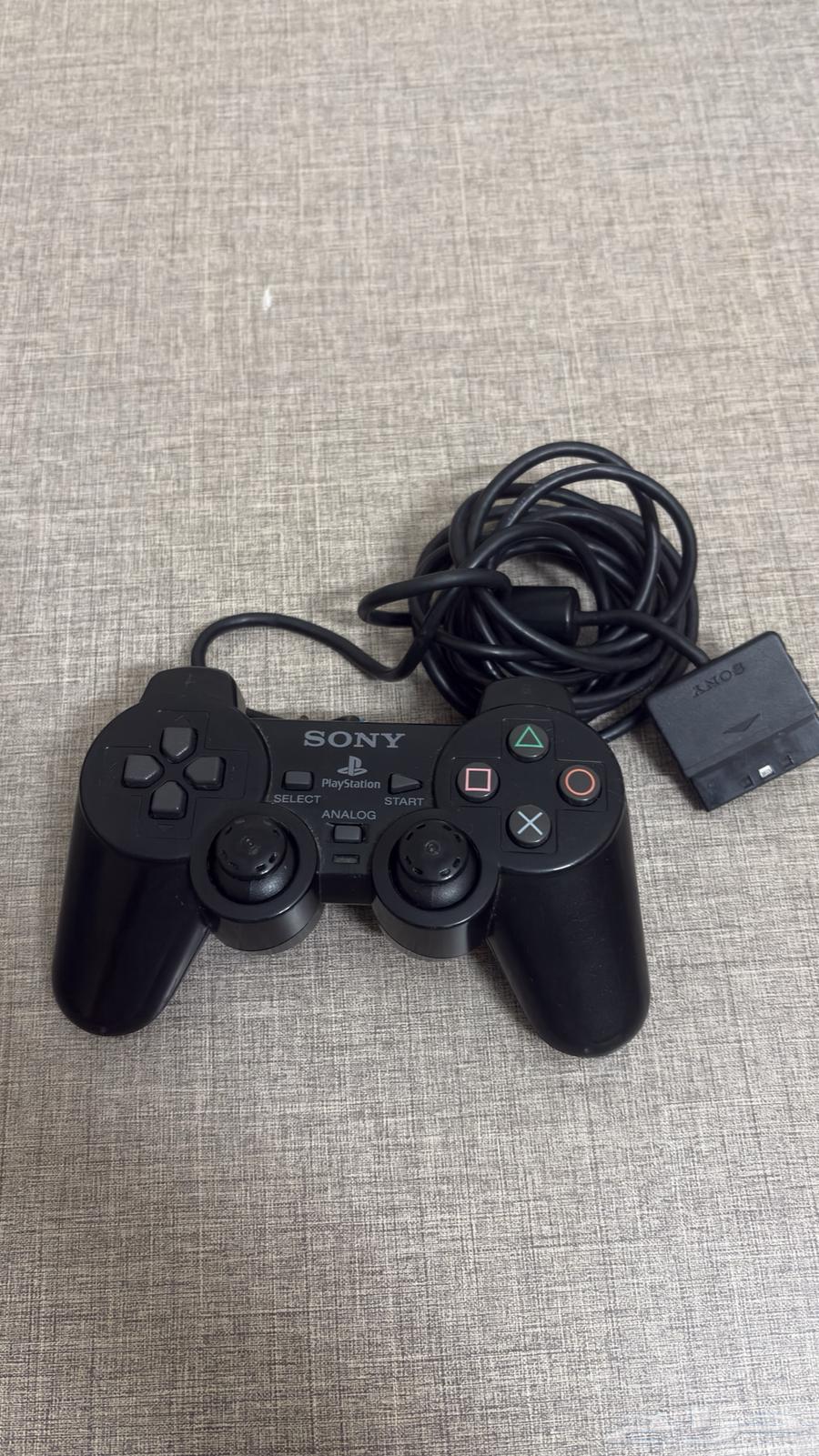 يده بلاستيشن 2 اصليه مع شريط كراش64551161563649110