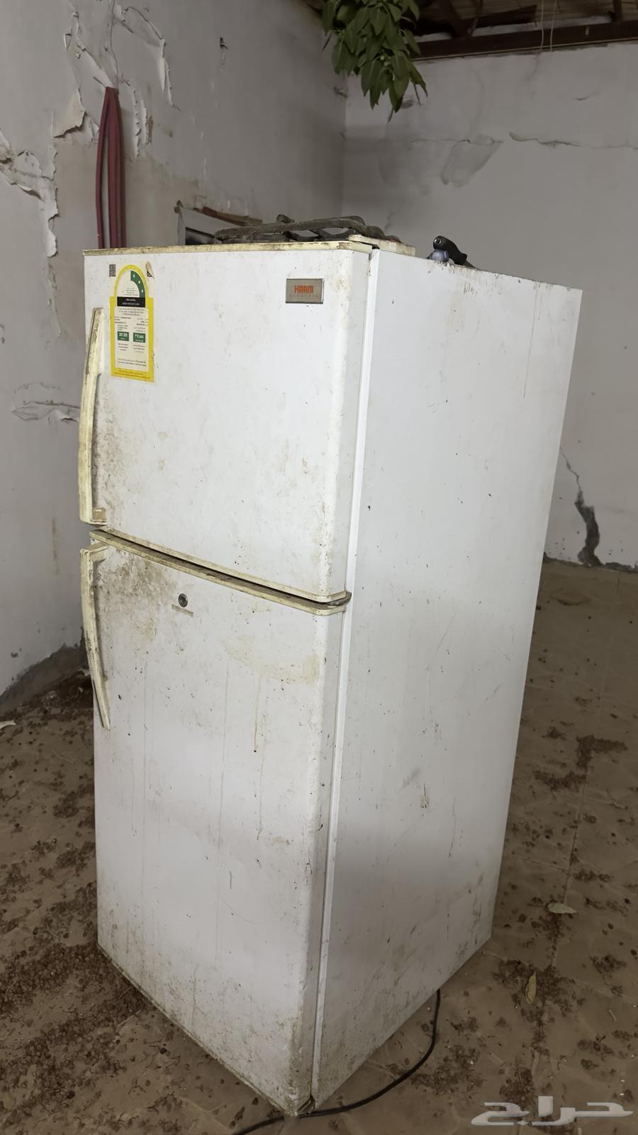 Refrigerator, two window air conditioners, gas stove64551003613058110