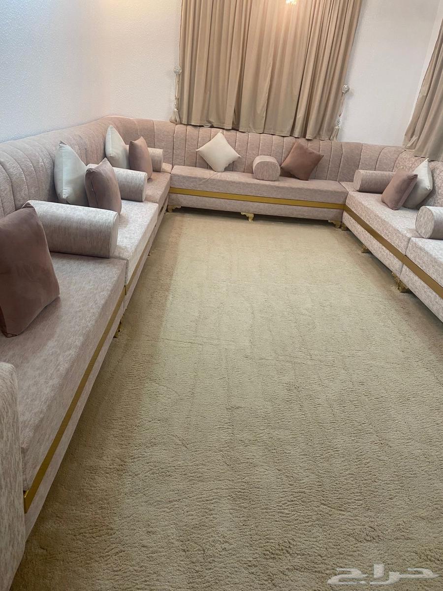 Sofa, curtains, and a living room carpet64544100595842110