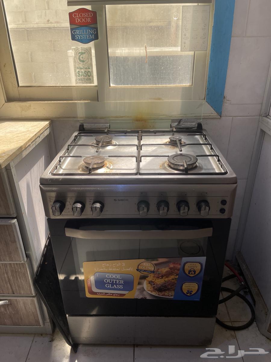 Dining table, stove, and bed64547569434626112