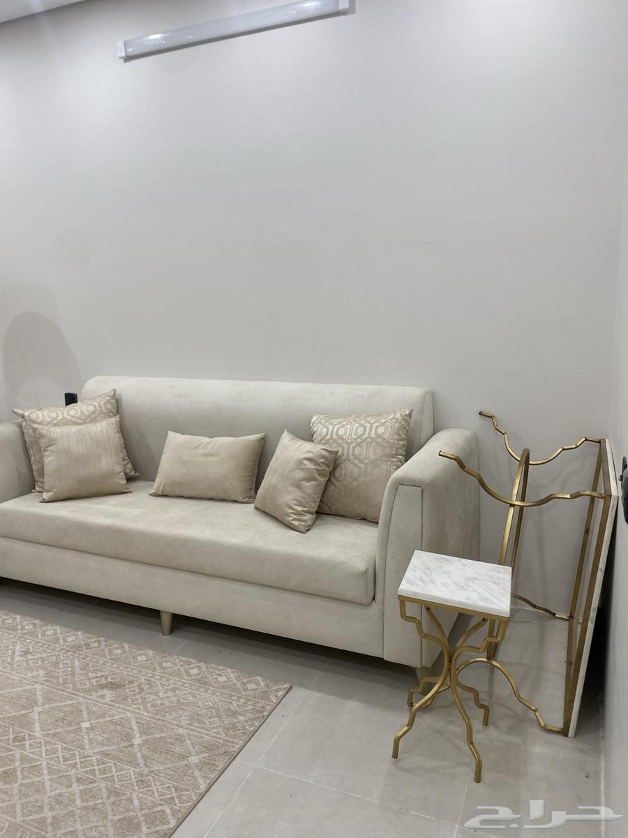 Clean three-piece sofa with table set and mat64550859840770112