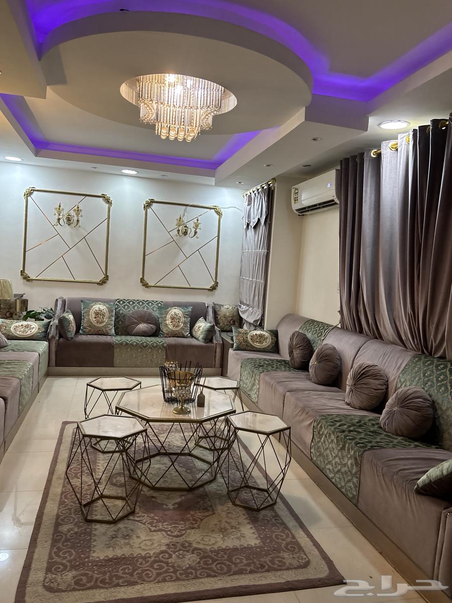 Clean sofa for sale with curtains, carpet, and tables64544340677635114