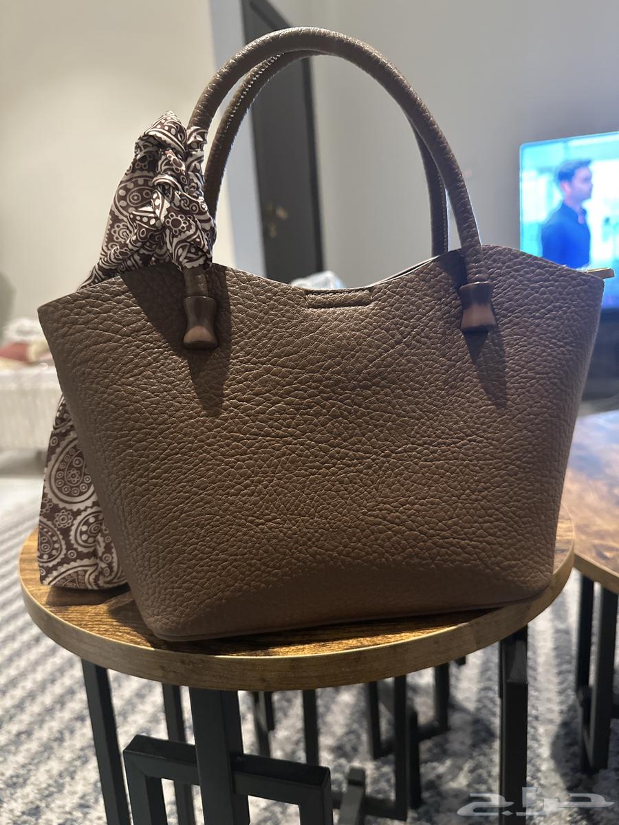 شنطة نسائية لون بني64551947721858110