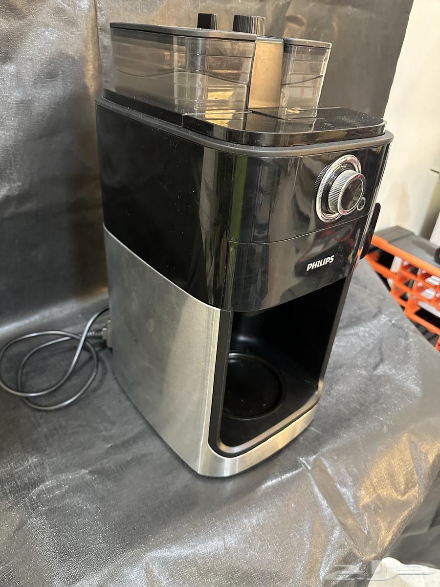 Coffee machine with grinder64547972589570111