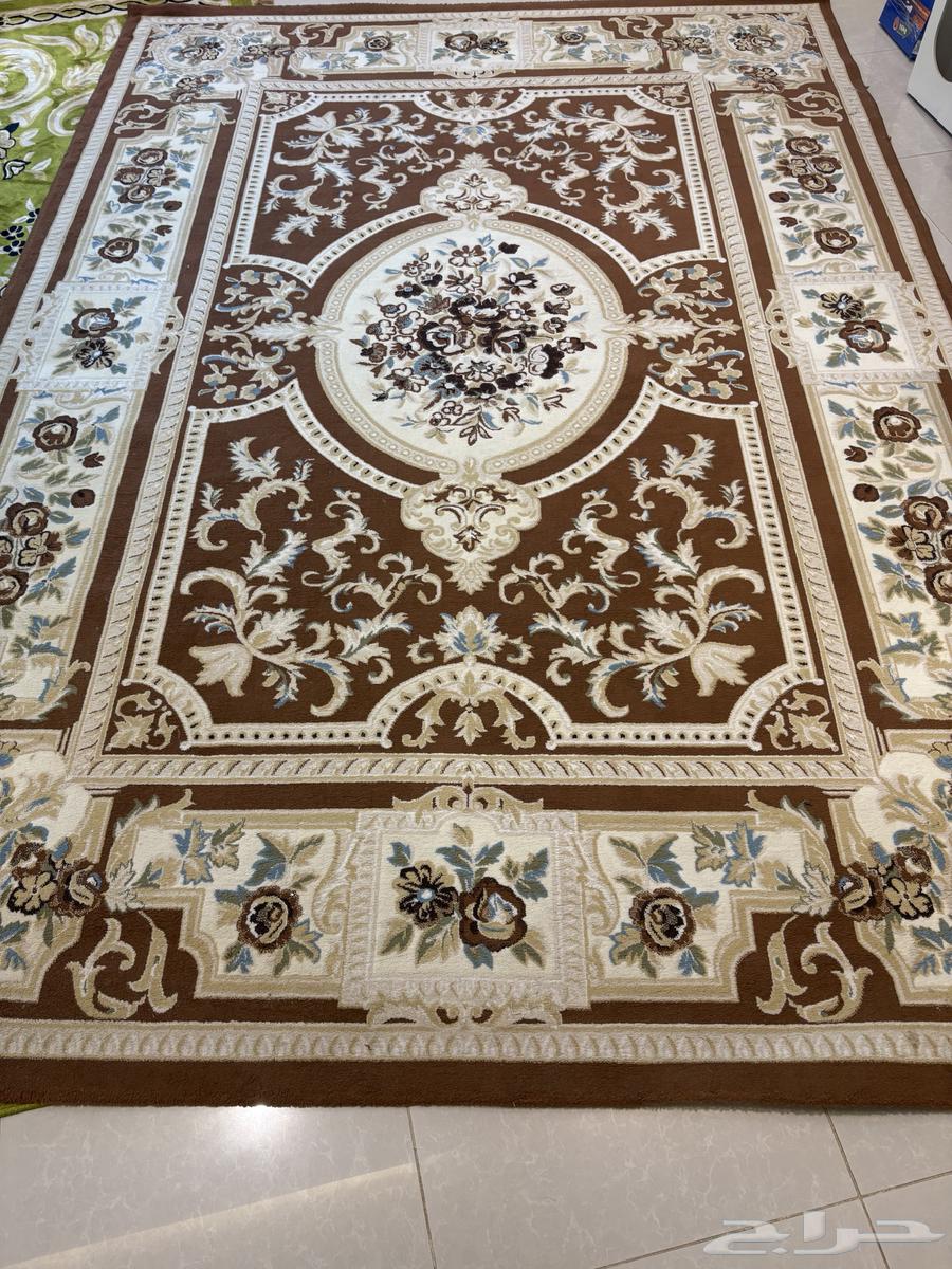 Two reception tables and a Turkish carpet64548967302147113