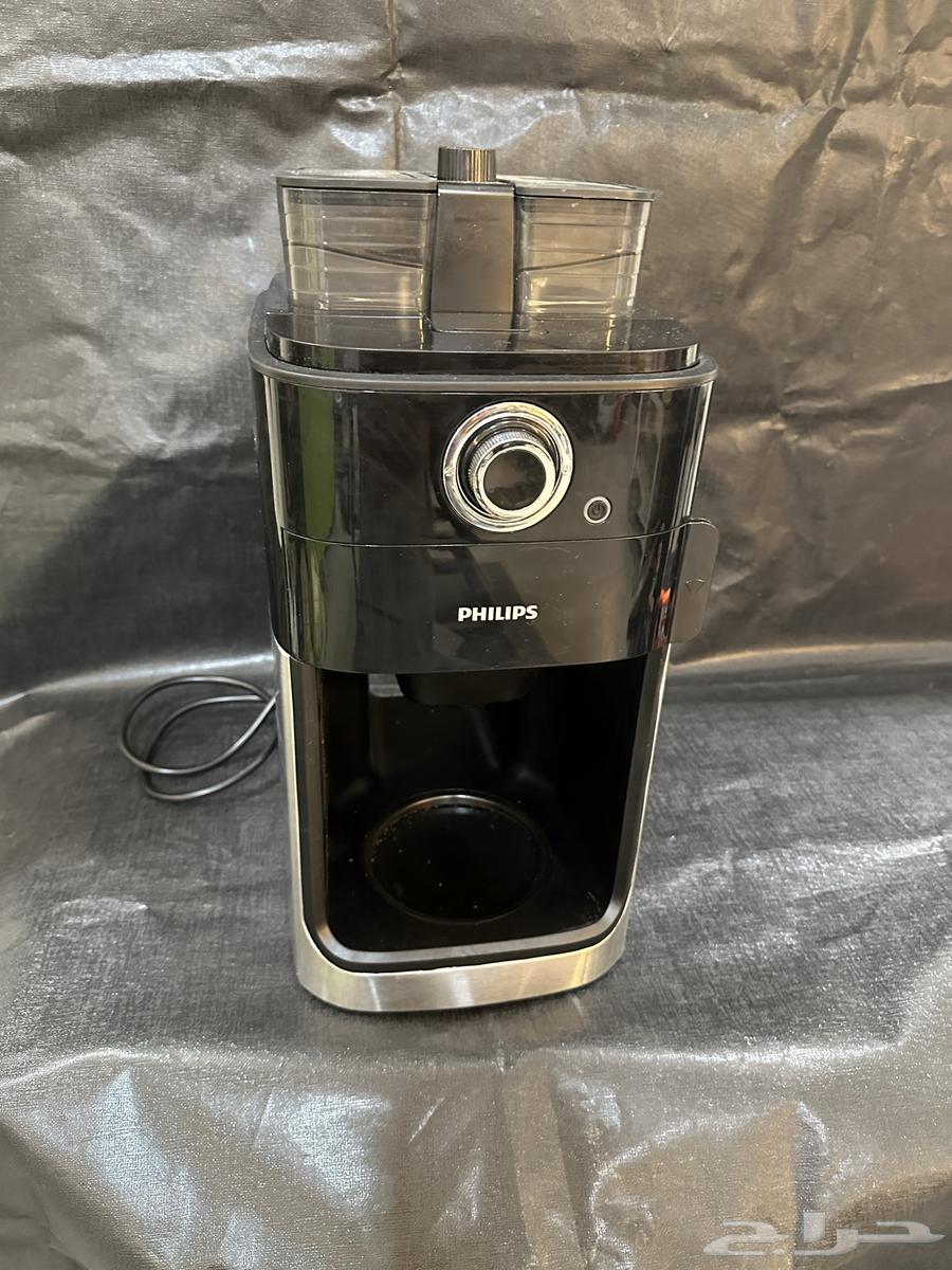 Coffee machine with grinder64547972589570110