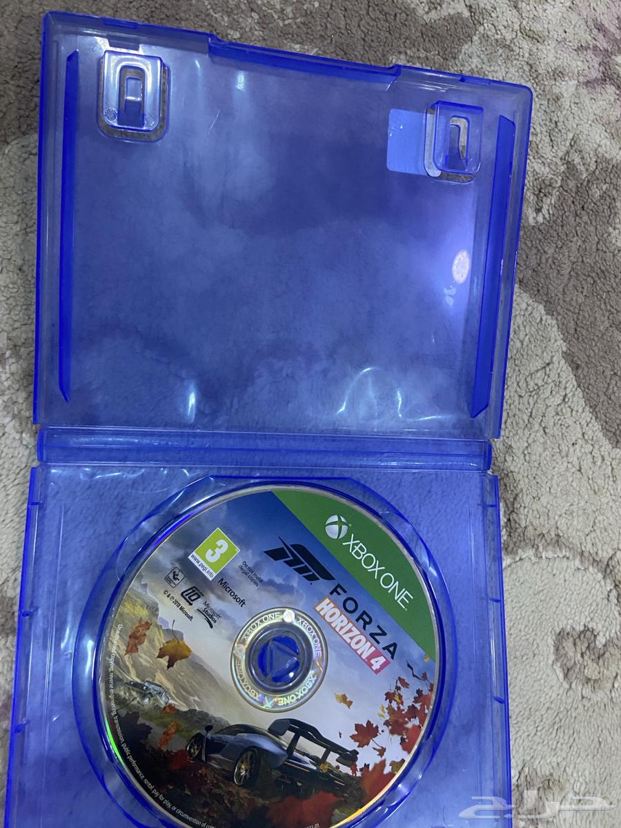 Sony 5 controller, Xbox controller, and Xbox tapes64542728952835112