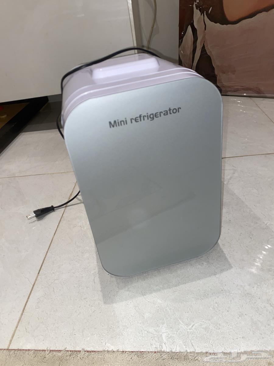 ثلاجه ذكيه متنقله شبه جديده مع شاحن سياره64544157153026110
