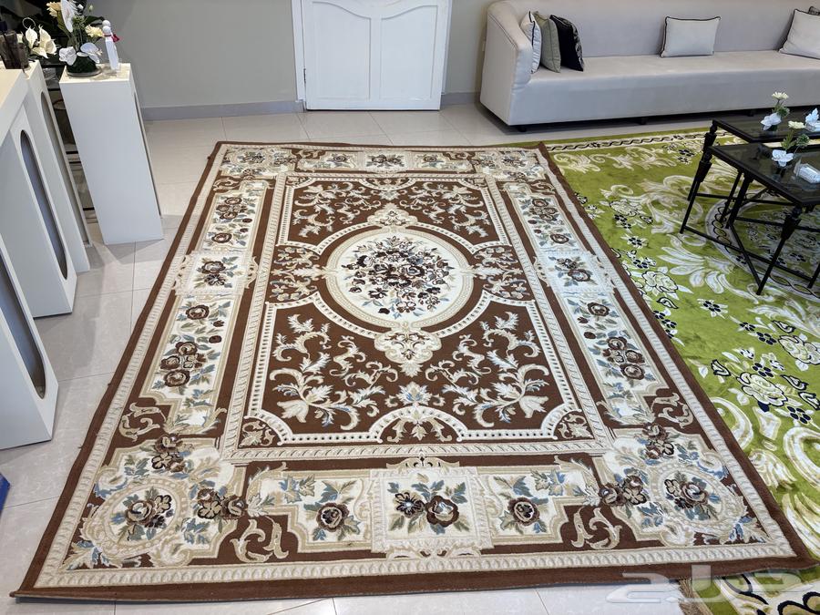 Two reception tables and a Turkish carpet64548967302147112