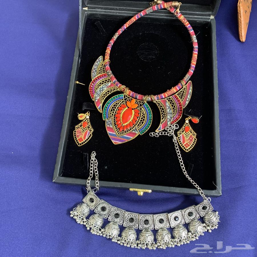 فساتين مقاس لارج اللخضر اورقنزا والاسود مطاطي   شنطه سودا64551490604801111