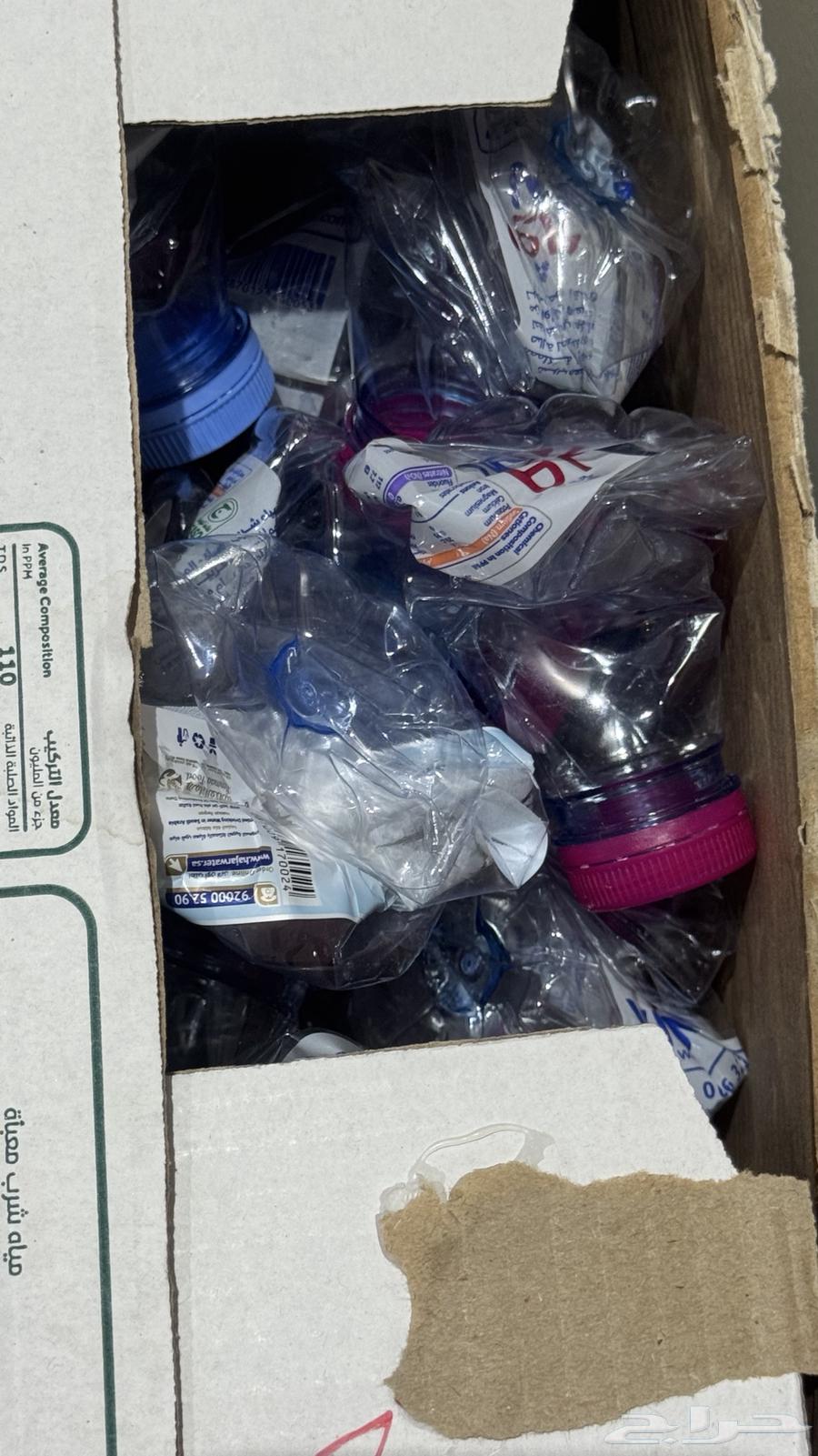 علب ماء بلاستيك فارغة لإعادة التدوير64557489044995111