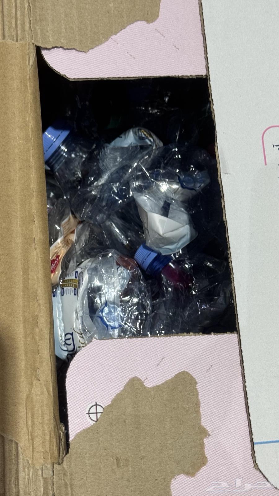 علب ماء بلاستيك فارغة لإعادة التدوير64557489044995110