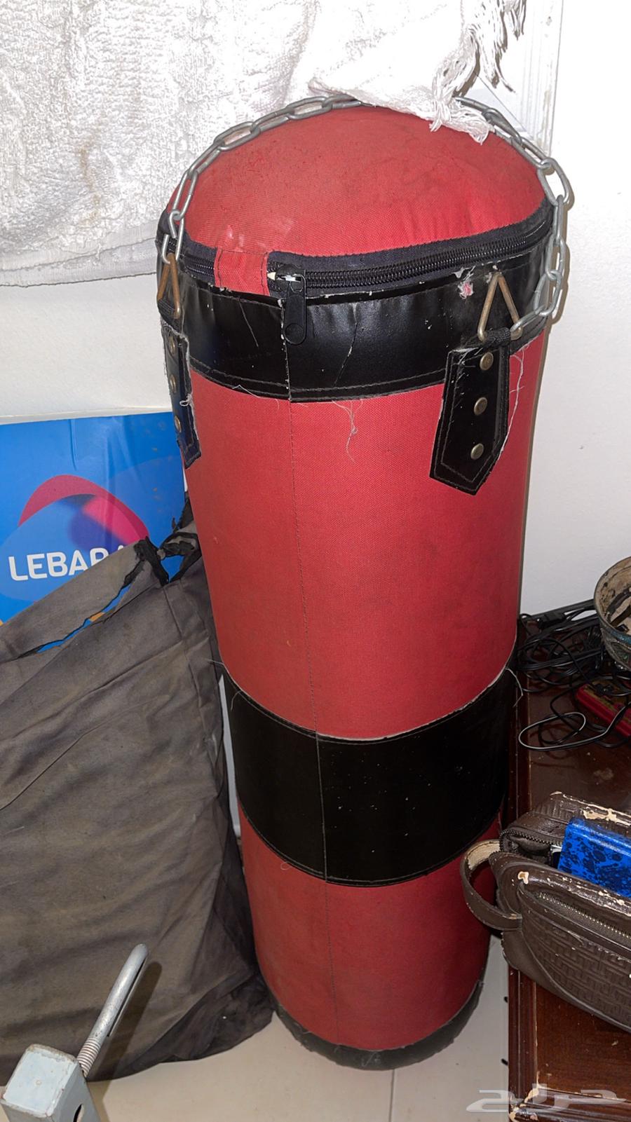 Punching bag, gloves, lights, and clean espresso coffee machine64555096060417112